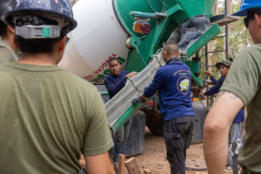 Cobra Gold 24; Marines with Marine Wing Support Squadron 171 lay concrete and do electrical work at the Ban Prakaet School