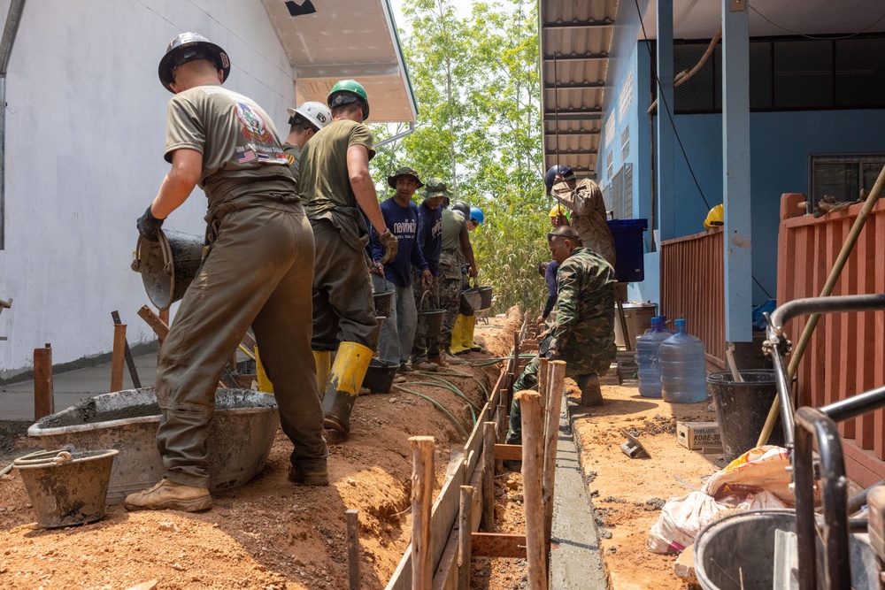 Cobra Gold 24; Marines with Marine Wing Support Squadron 171 lay concrete and do electrical work at the Ban Prakaet School