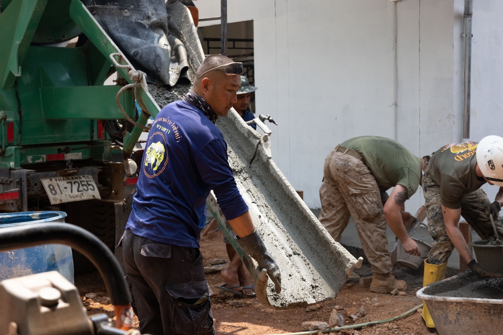 Cobra Gold 24; Marines with Marine Wing Support Squadron 171 lay concrete and do electrical work at the Ban Prakaet School