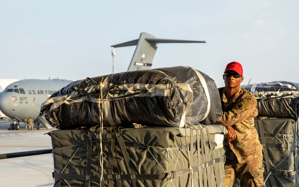 Airmen, Soldiers load C-17s with humanitarian aid bound for Gaza