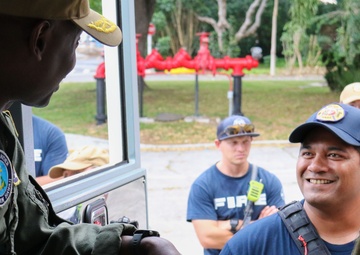 Rear Adm. Barnett meets with Navy Federal Fire Department firefighters