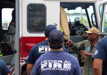 Rear Adm. Barnett meets with Navy Federal Fire Department firefighters