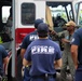 Rear Adm. Barnett meets with Navy Federal Fire Department firefighters