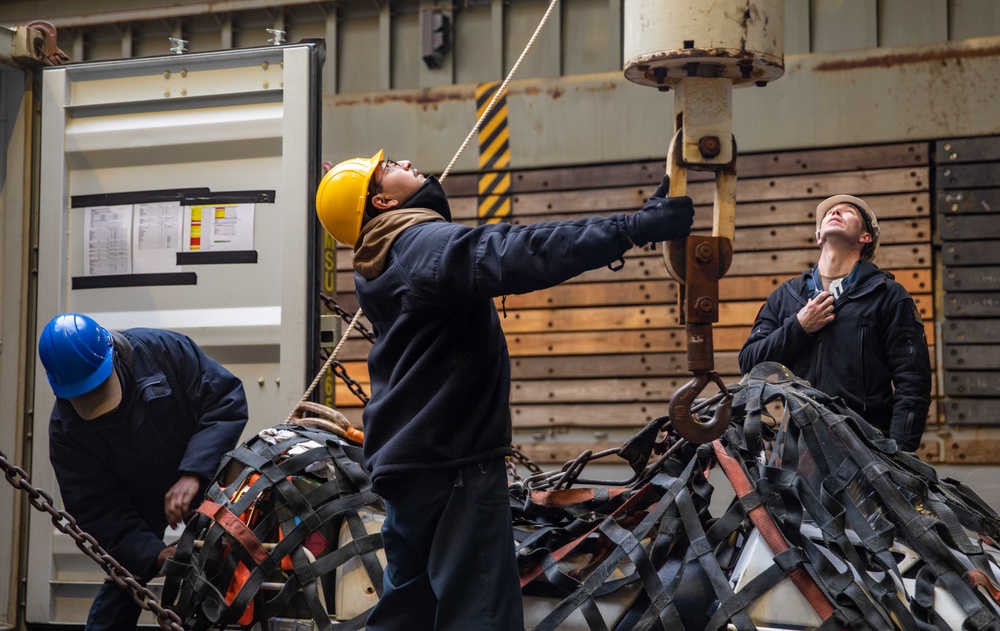 USS Gunston Hall conducts crane operations in support of Steadfast Defender 24