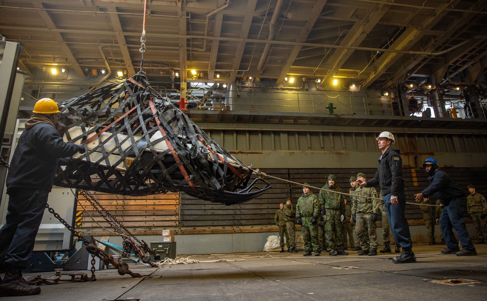 USS Gunston Hall conducts crane operations in support of Steadfast Defender 24