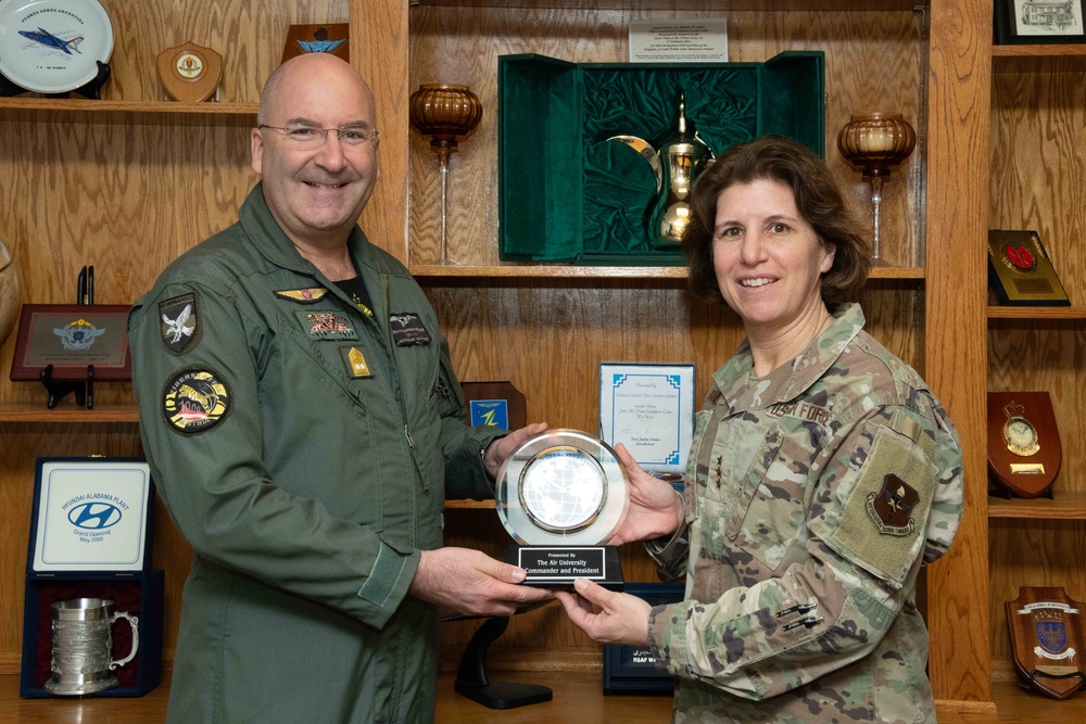 Au Commander exchanges gifts with international CFACC 24B participants