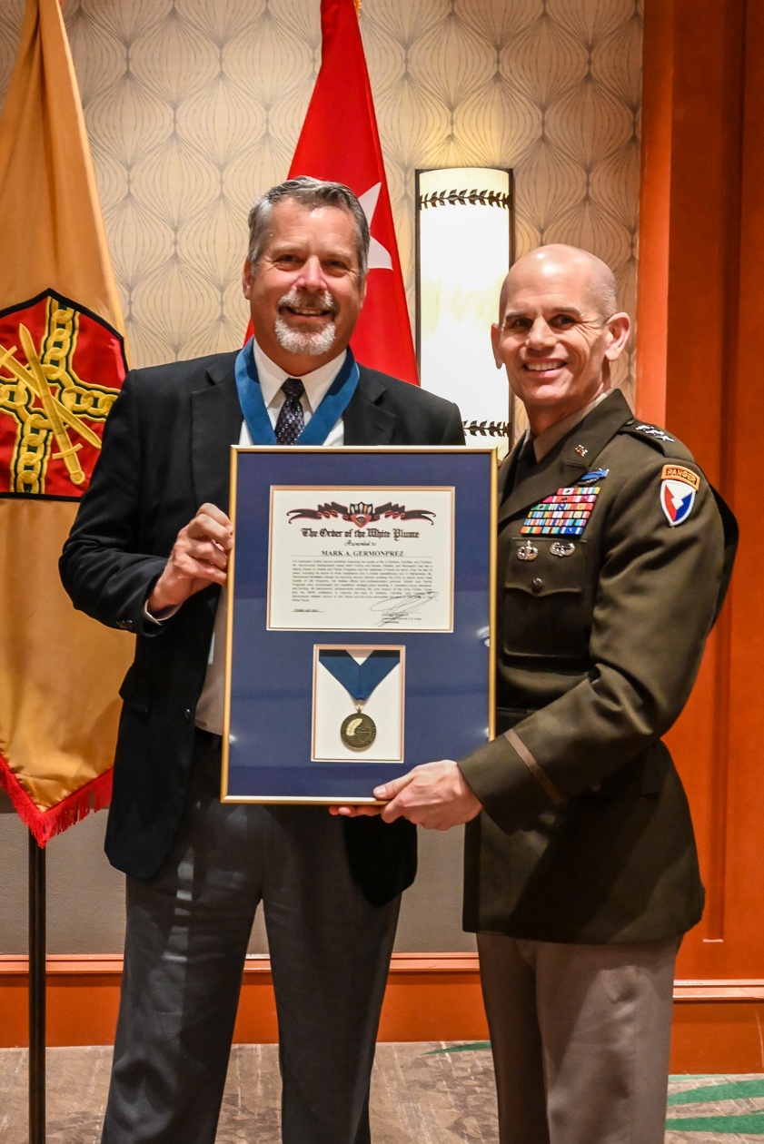 MWR director earns high honor, inducted into Order of the White Plume