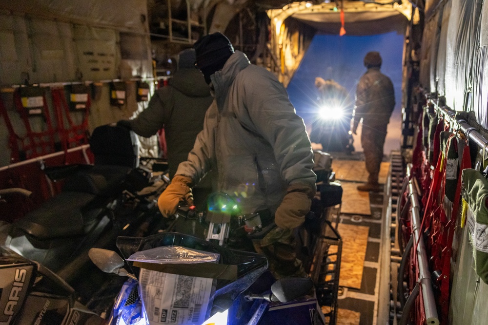 ARCTIC EDGE 24: 19th SFG(A) unloads snow machine from C-130