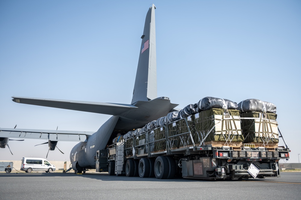 Airmen, Soldiers load AFCENT C-130s with humanitarian aid bound for Gaza