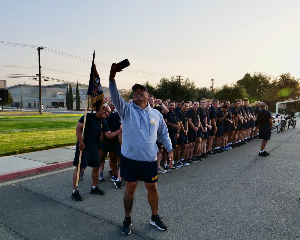 CMC Martinez Takes Selfie with Sailors