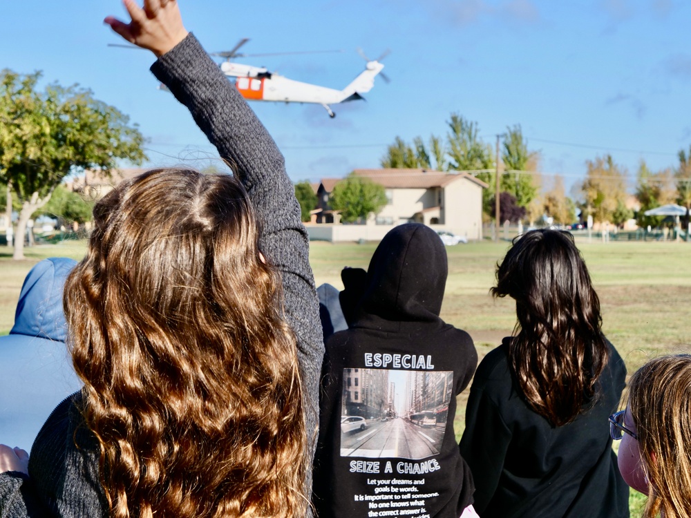 Students Wave to SAR Helicopter