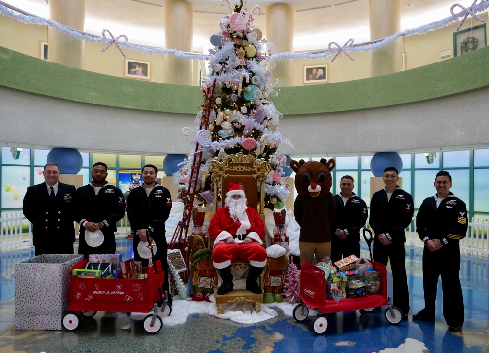 Sailors Give Presents at Children's Hospital