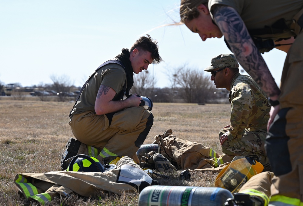 Guard Firefighters conduct live burn training