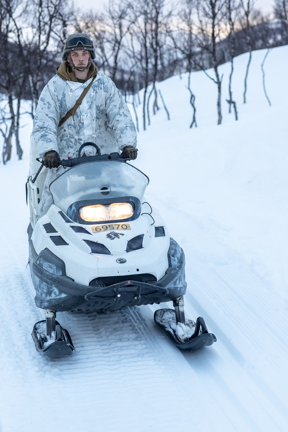 Exercise Nordic Response 24: U.S. Marines with Combat Logistics Battalion 6 complete a snowmobile resupply