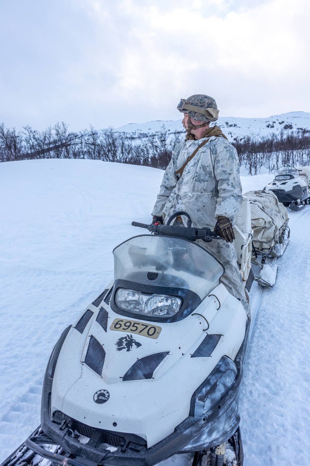 Exercise Nordic Response 24: U.S. Marines with Combat Logistics Battalion 6 complete a snowmobile resupply