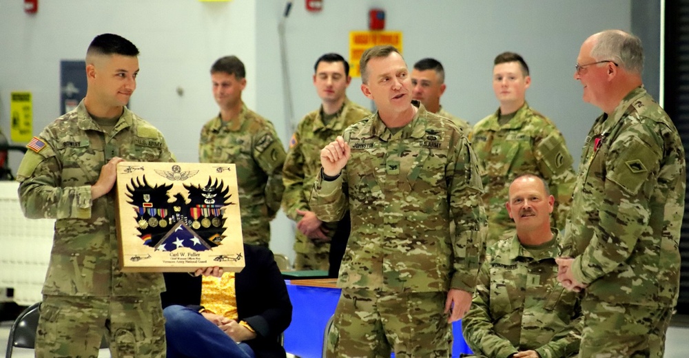 Col John Johnston Presents Award