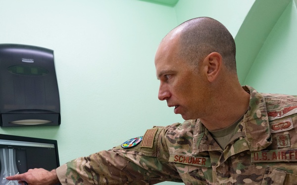 USAF orthopedic surgeon conducts consultations in St. Vincent hospital