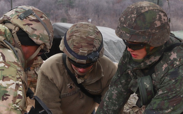 U.S. Soldiers and ROK soldiers attach fuel transfer lines, Freedom Shield 24