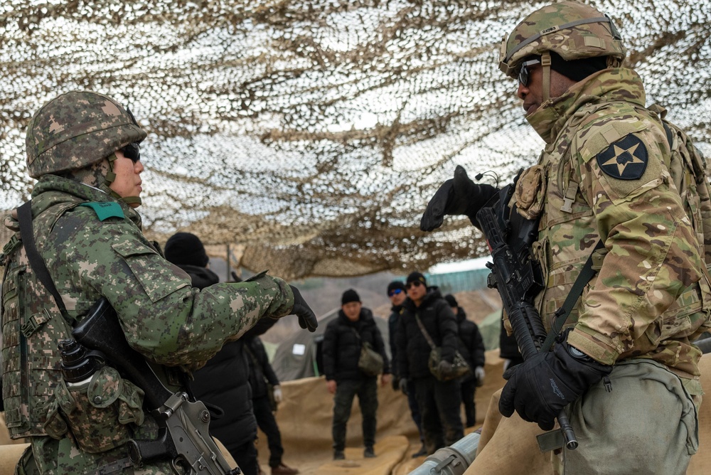 U.S. Soldiers and ROK soldiers discuss joint training Freedom Shield 24