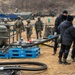 U.S. Soldiers and ROK soldiers interconnect fuel transfer equipment as part of Freedom Shield 24