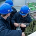 USS Ronald Reagan (CVN 76) Sailors install a repeater panel