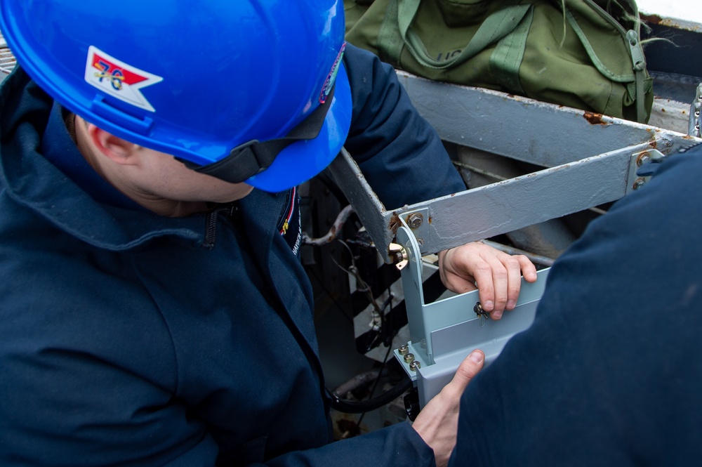 USS Ronald Reagan (CVN 76) Sailors install a repeater panel