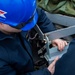 USS Ronald Reagan (CVN 76) Sailors install a repeater panel