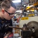 USS Ronald Reagan (CVN 76) Sailors craft a machine part