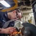 USS Ronald Reagan (CVN 76) Sailors craft a machine part