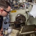 USS Ronald Reagan (CVN 76) Sailors craft a machine part