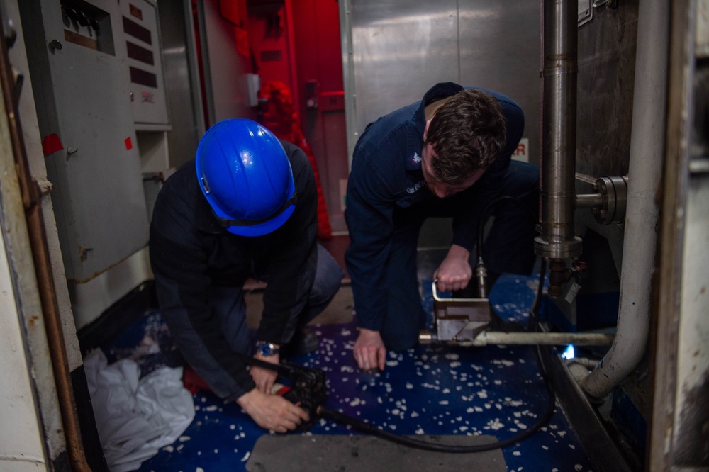 USS Ronald Reagan (CVN 76) Sailors perform repairs and maintenance