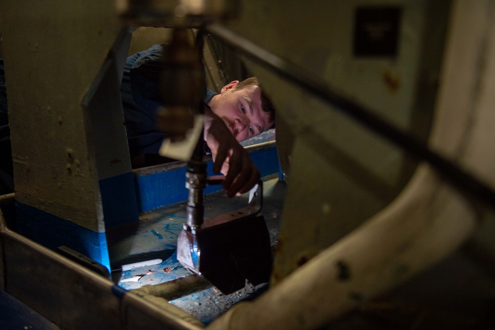 USS Ronald Reagan (CVN 76) Sailors perform repairs and maintenance