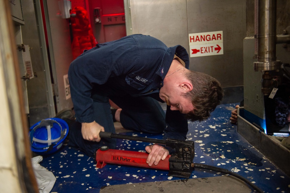 USS Ronald Reagan (CVN 76) Sailors perform repairs and maintenance