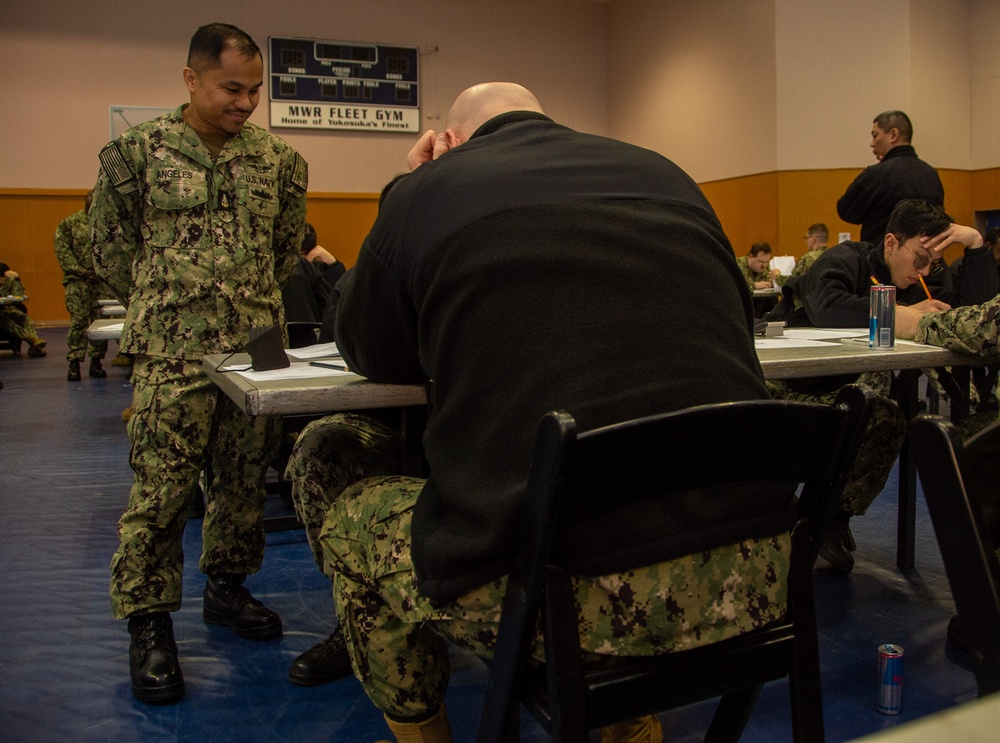 USS Ronald Reagan (CVN 76) Sailors take Navy-wide E-6 advancement exam