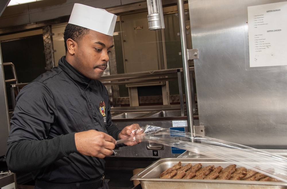 USS Ronald Reagan (CVN 76) Sailors prepare food in wardroom galley