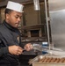 USS Ronald Reagan (CVN 76) Sailors prepare food in wardroom galley