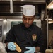 USS Ronald Reagan (CVN 76) Sailors prepare food in wardroom galley