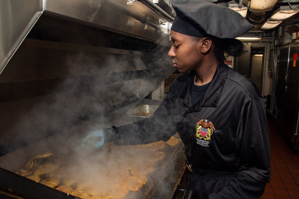 USS Ronald Reagan (CVN 76) Sailors prepare food in wardroom galley