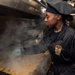 USS Ronald Reagan (CVN 76) Sailors prepare food in wardroom galley