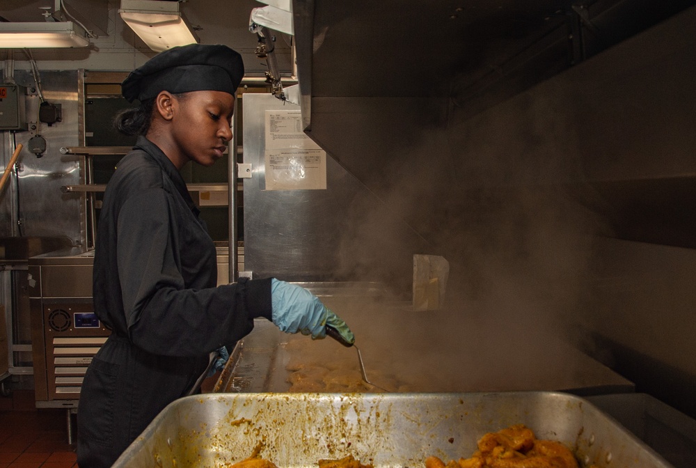 USS Ronald Reagan (CVN 76) Sailors prepare food in wardroom galley