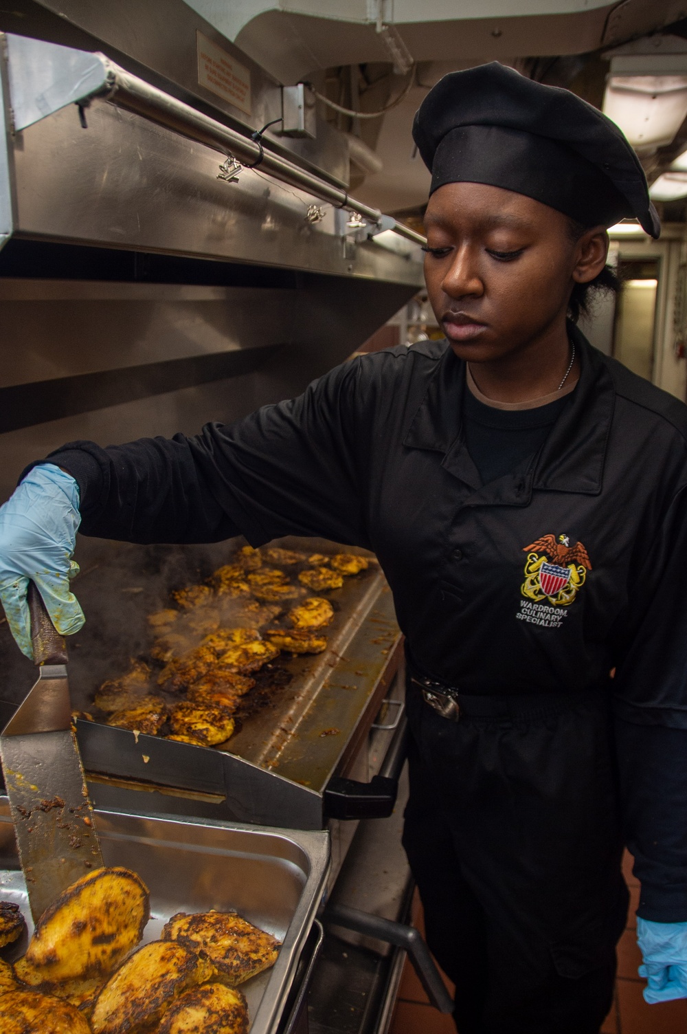 USS Ronald Reagan (CVN 76) Sailors prepare food in wardroom galley