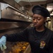 USS Ronald Reagan (CVN 76) Sailors prepare food in wardroom galley