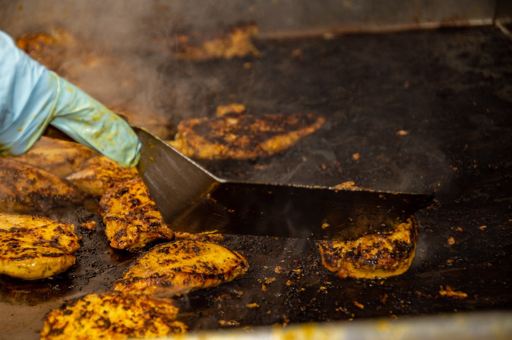 USS Ronald Reagan (CVN 76) Sailors prepare food in wardroom galley