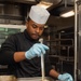 USS Ronald Reagan (CVN 76) Sailors prepare food in wardroom galley