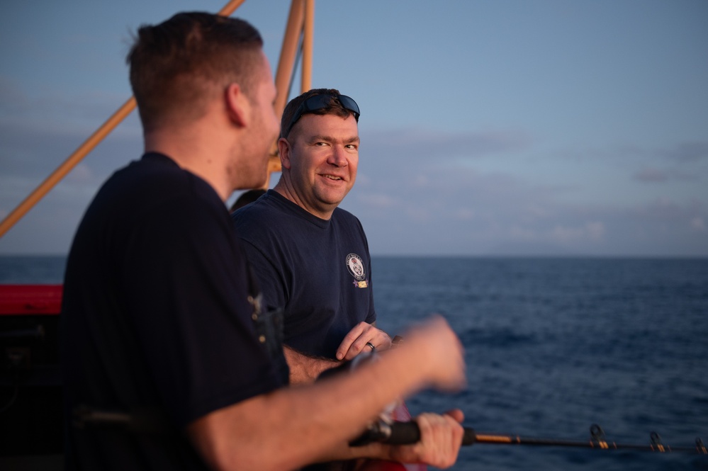 Coast Guard Cutter Polar Star (WAGB 10) crew conducts fish call off the coast of Guam