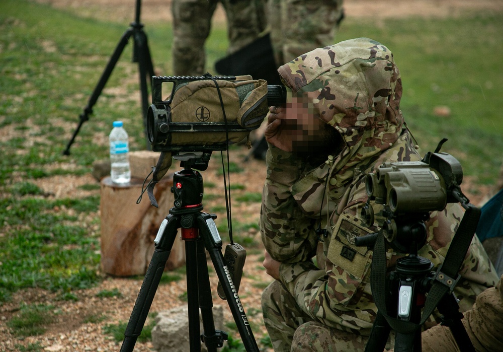 Greek special operations soldier uses spotting scope