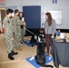 U.S. Sailors visit the Mutts With A Mission Table