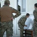 Green Berets and Greek SOF soldiers discuss tactics