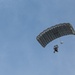 Green Beret descends to Megara drop zone