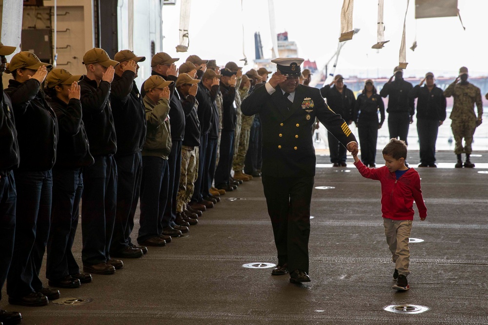 USS Tripoli Master Chief Piping Ashore